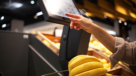 Touch POS system at a busy billing counter